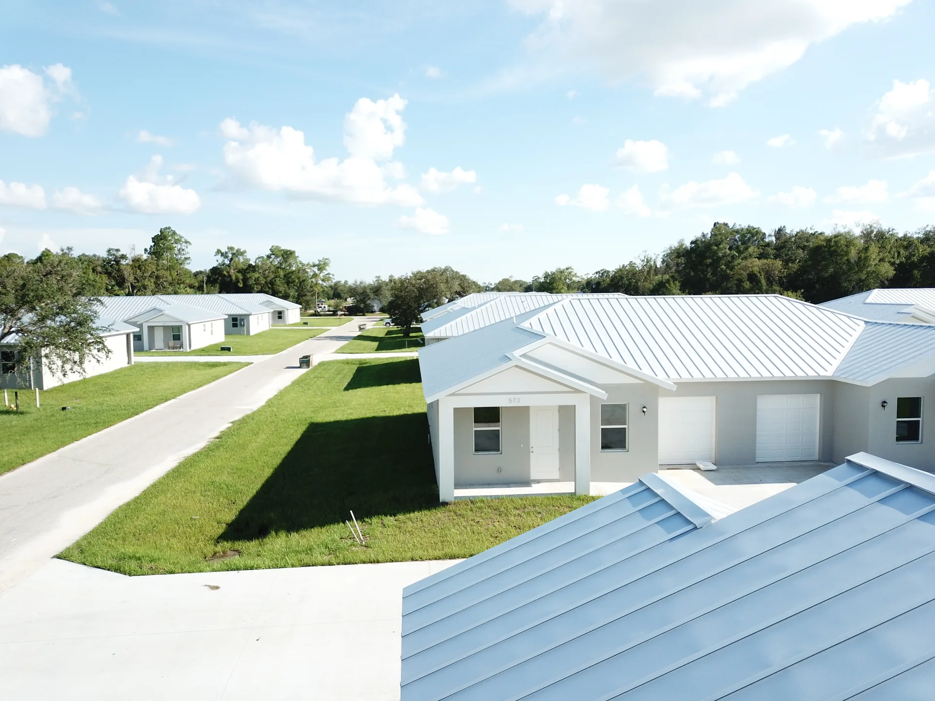 SLD suburban community with quality single-family homes and green lawns